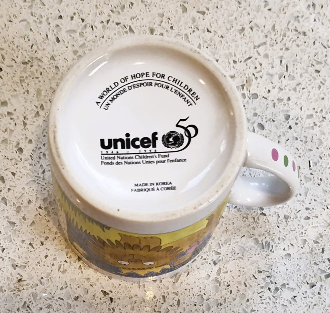 Vintage childrens mug: Lion and Girl, Unicef, N. Costa, Italy