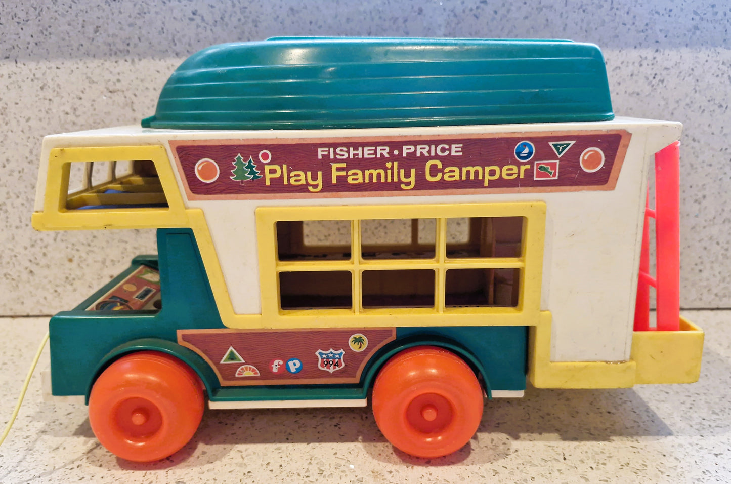 Fisher-Price Play Family Camper toy on a light gray background