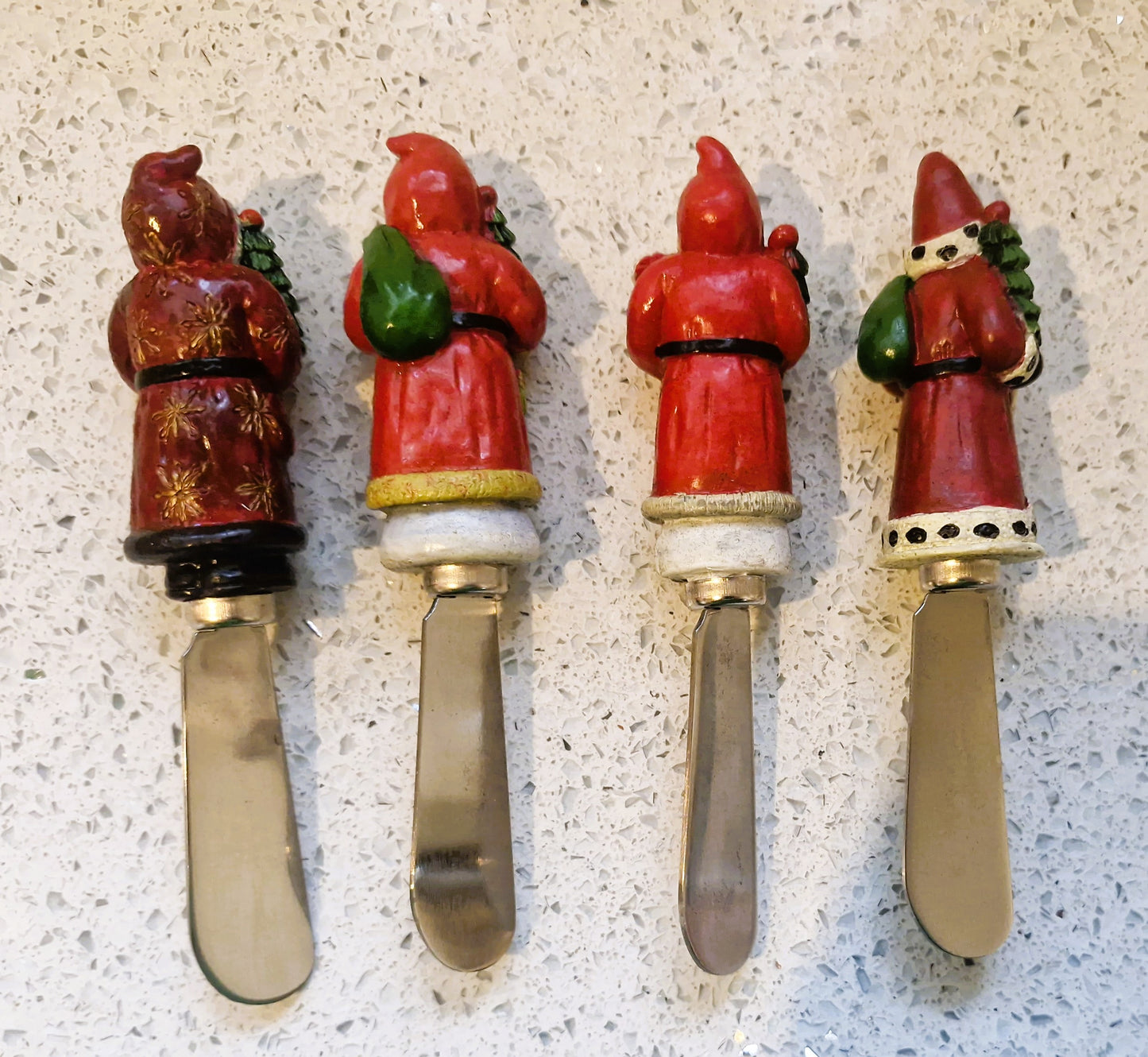Christopher Radko Home for the Holidays Santa spreading knives: Santa Butter spreaders
