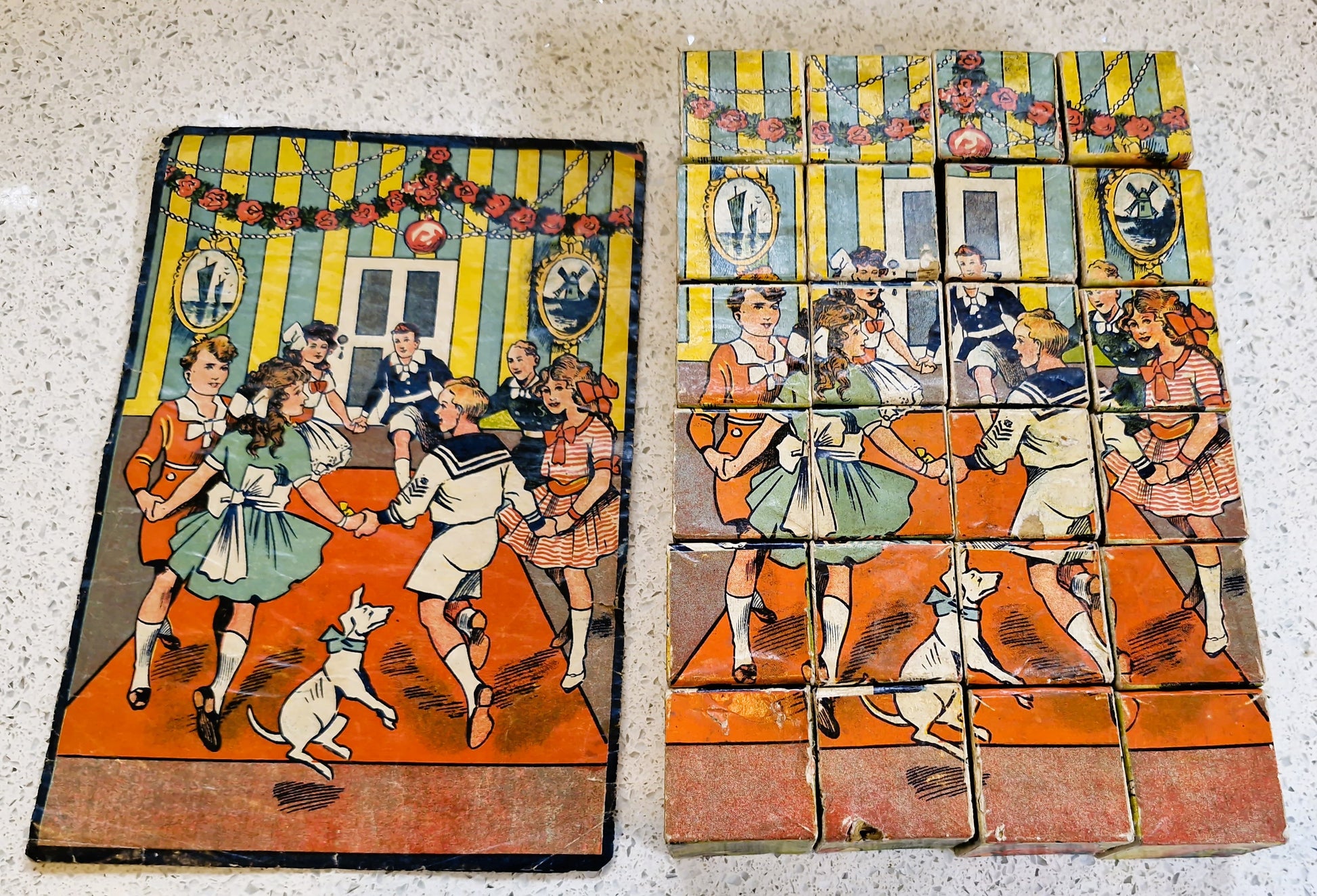 1930s Childrens toy showing childrens borthday party in a block jigsaw 